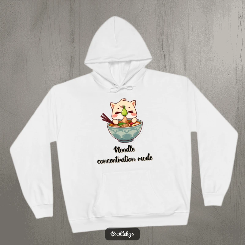 Funny Ramen Bowl Hoodie showing a character balancing a green onion with extreme focus, perfect for chilly days.