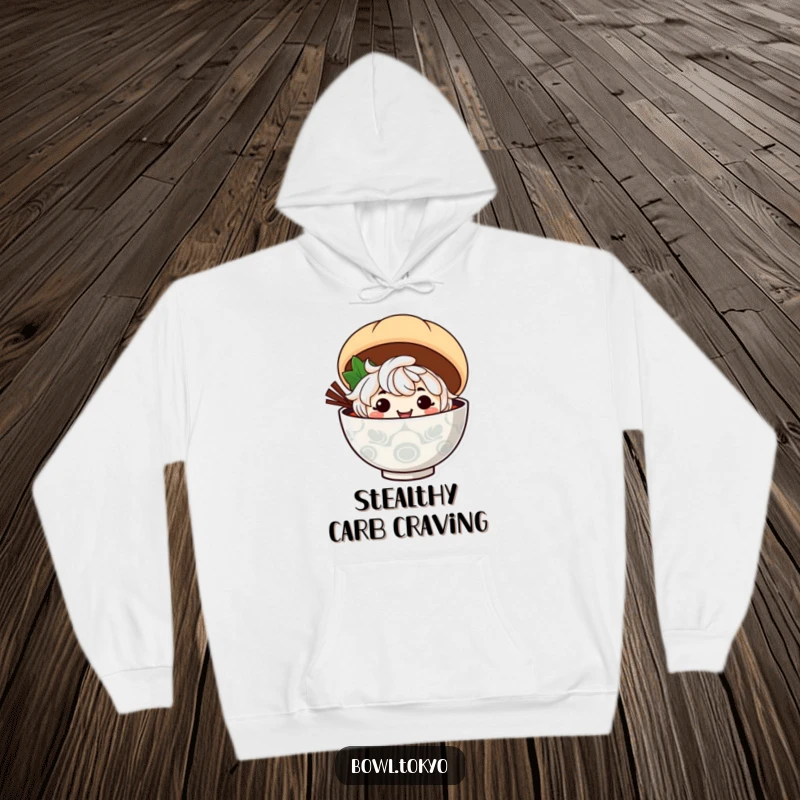 Funny ramen bowl character with a cheeky grin peeks out from behind a soft steamed bun on this hoodie.