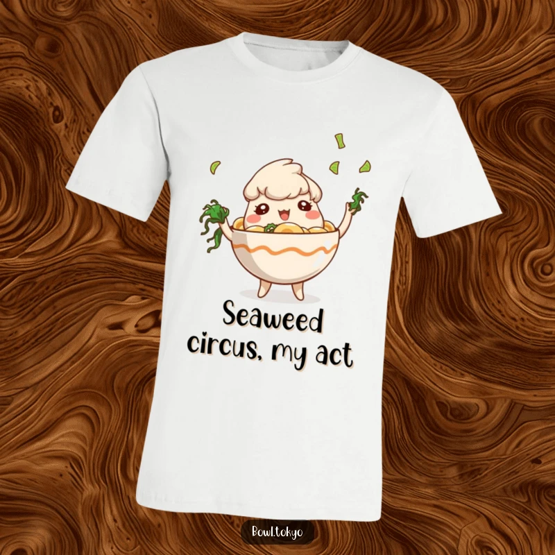 Funny Juggling Ramen Bowl T-Shirt with a playful character effortlessly juggling tiny pieces of seaweed, a delightful sight.