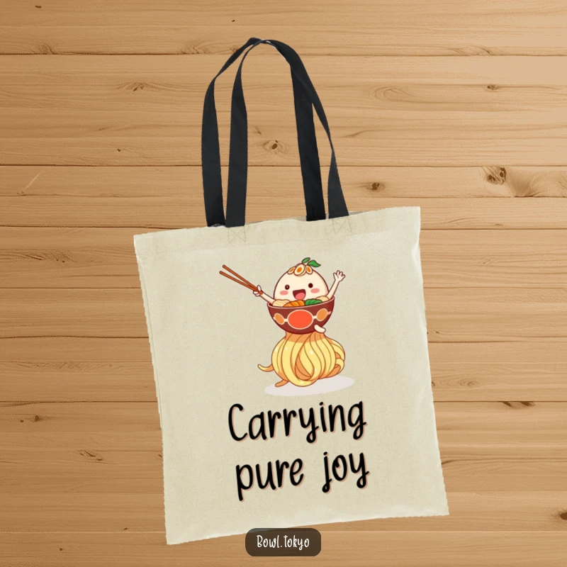 Funny tote bag with a happy ramen bowl character bouncing on a giant noodle, practical and humorous for everyday use.